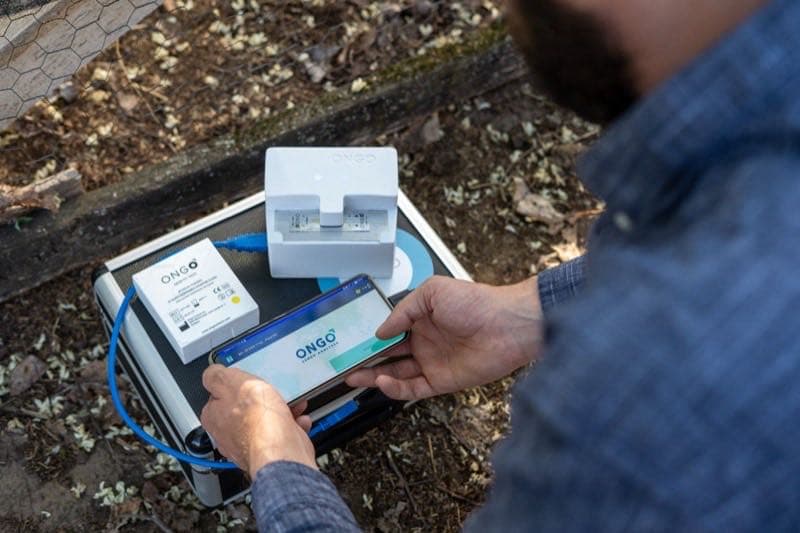 Veterinarian using Ongo Vision for on-site semen analysis in the field